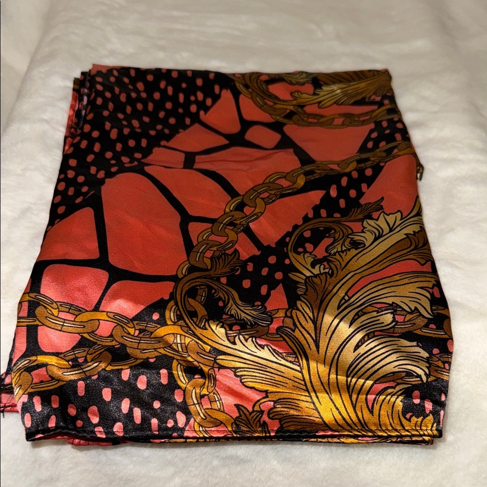 Elegant Silk Scarf with Gold and Black Pattern